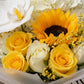 Close-up of sunflower, white orchid and yellow roses in Summer Meadow bouquet by AIWA Flowers