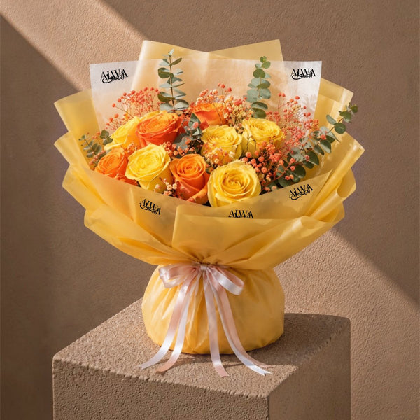 Yellow and orange roses with gypsophila and eucalyptus in gold wrap - Summer Time by AIWA Flowers