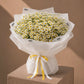 White daisy bouquet with yellow centers by AIWA Flowers Dubai