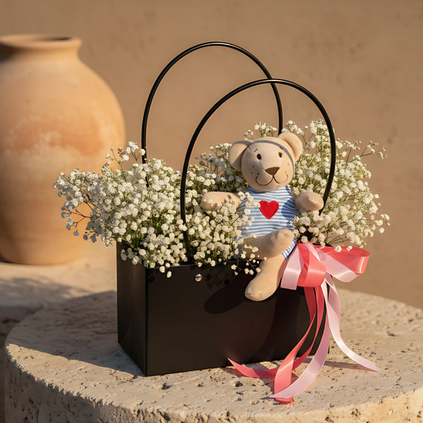 Teddy’s Cloud bag-box with white gypsophila and a cute teddy bear