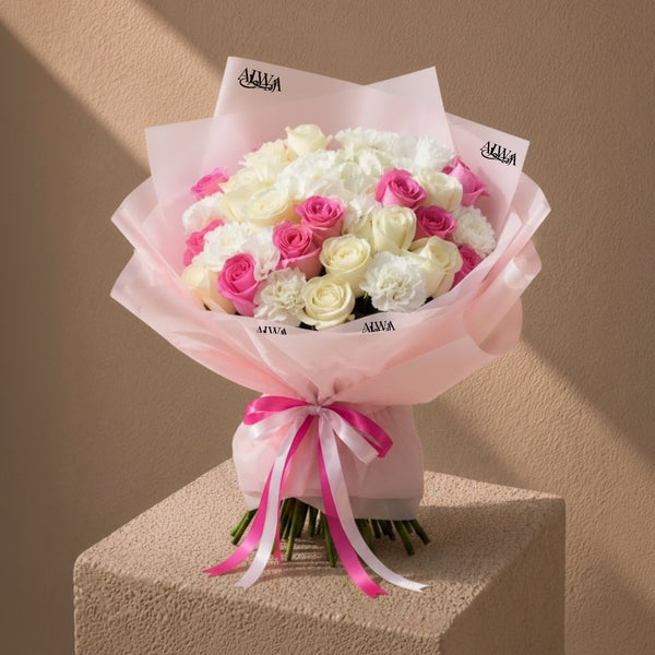 Pink and white roses with white carnations in light pink wrap - Tenderness by AIWA Flowers