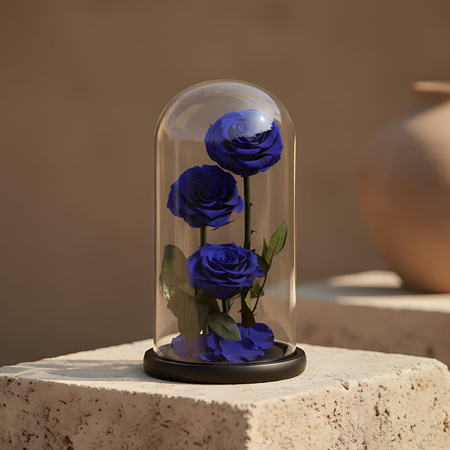 Three large blue preserved infinity roses in clear glass dome by Aiwa Flowers