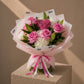 Pink roses, white hydrangea and lilies with a pink yarn heart in blush wrap - Unwavering Love by AIWA Flowers