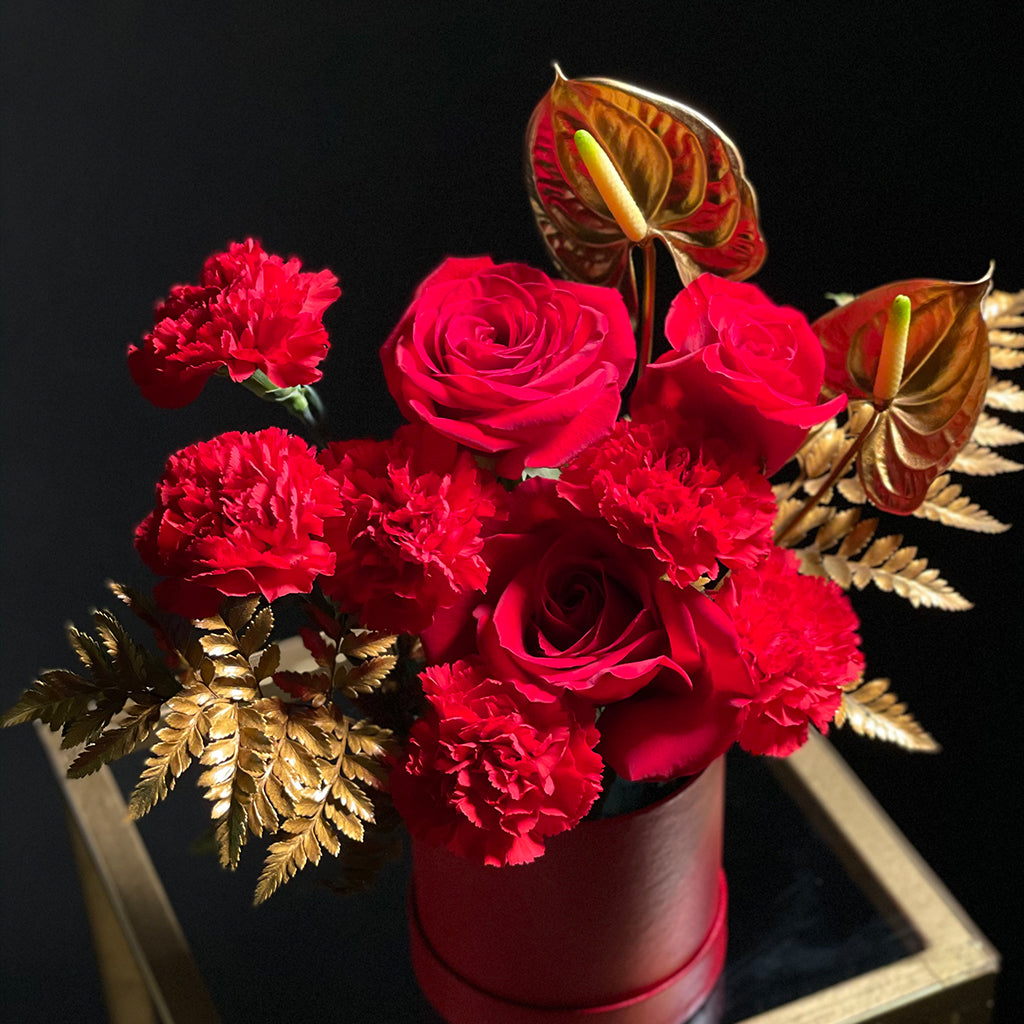 Red rose with box