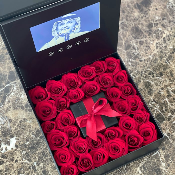 Red Roses in a Video Box with Gift