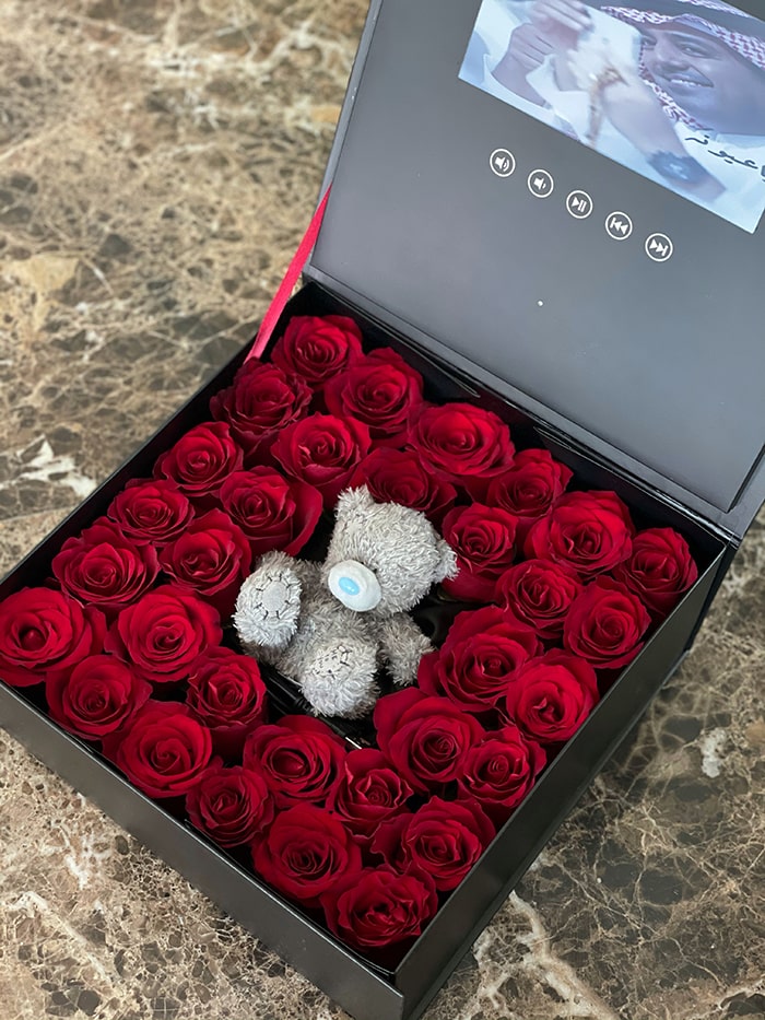Red Roses in a Video Box with Teddy Bear