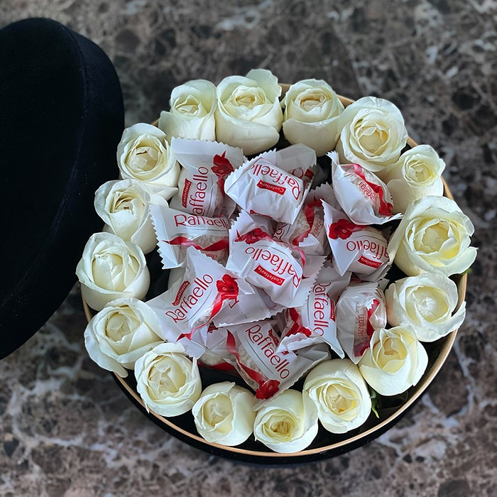 Chocolate with White Roses in a Black Velvet Round Box