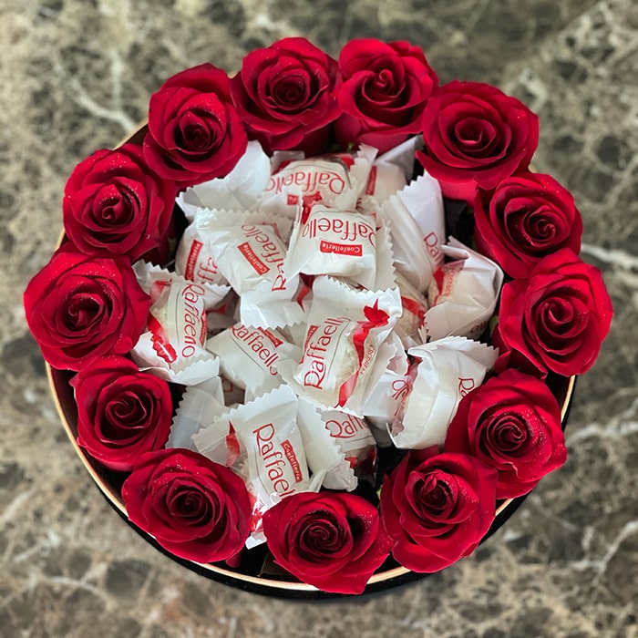 Red Roses in a Black Velvet Round Box